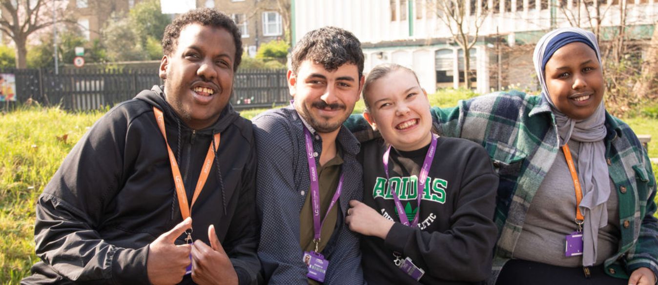 A group of four inclusive learning students posing together for the photo