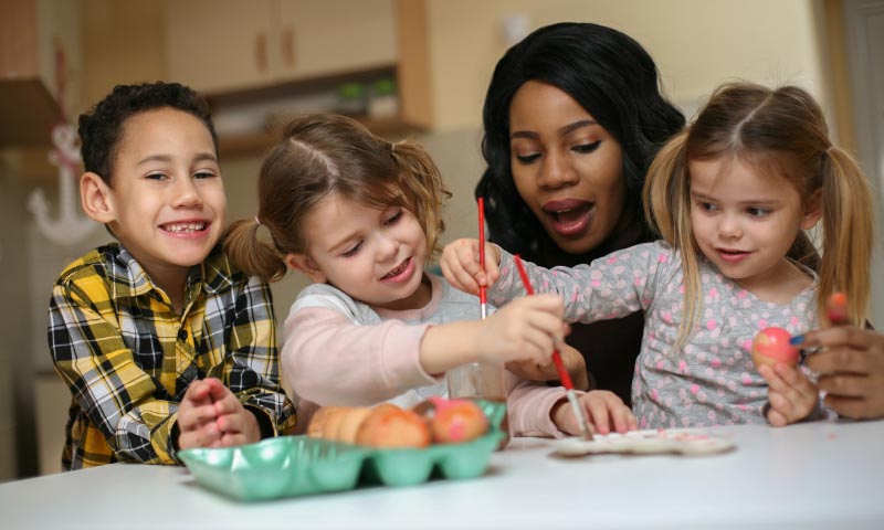 A student teacher supervising young children